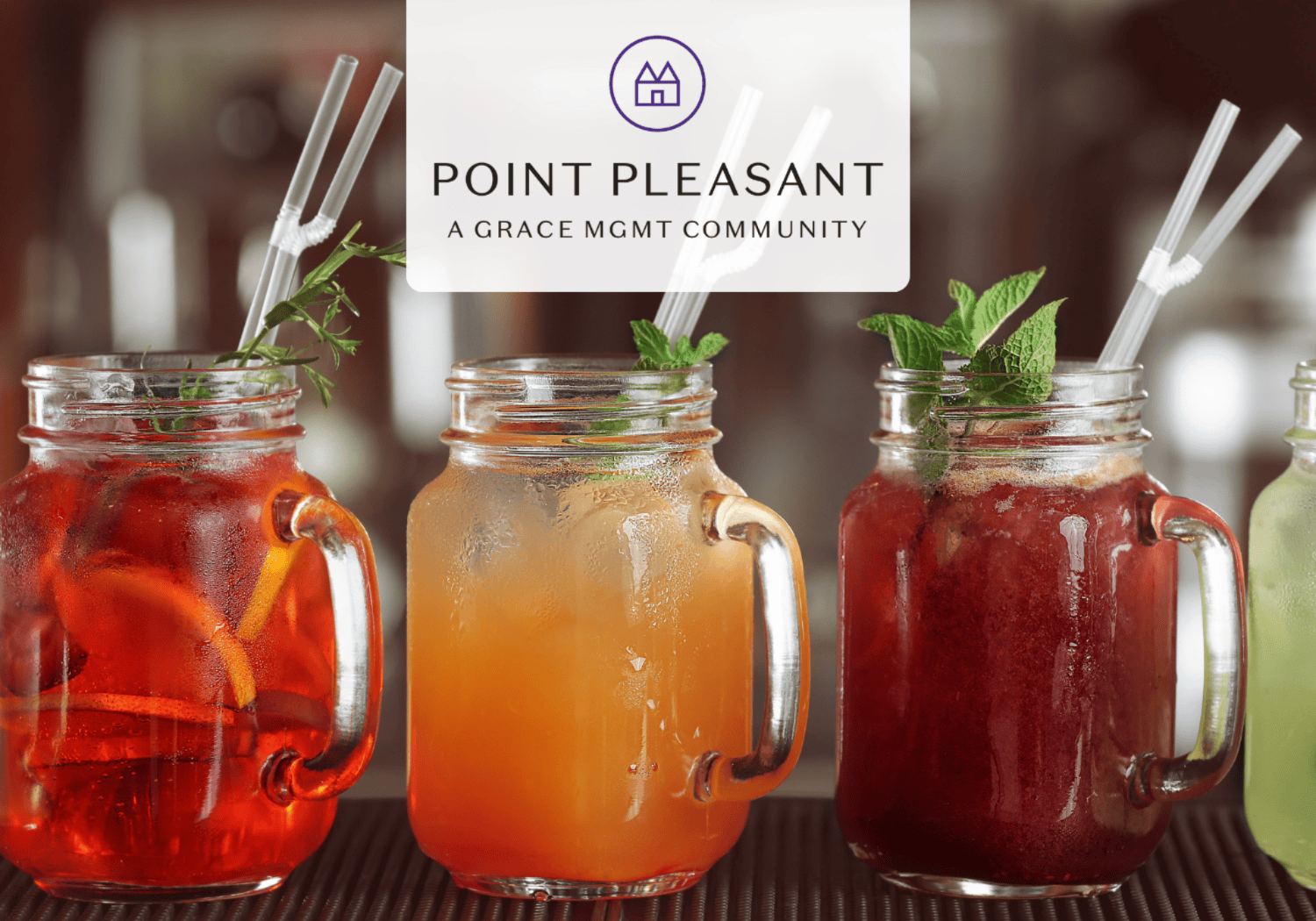 Three iced drinks in mason jars with mint and straws on a bar counter; Point Pleasant logo overlay at top.